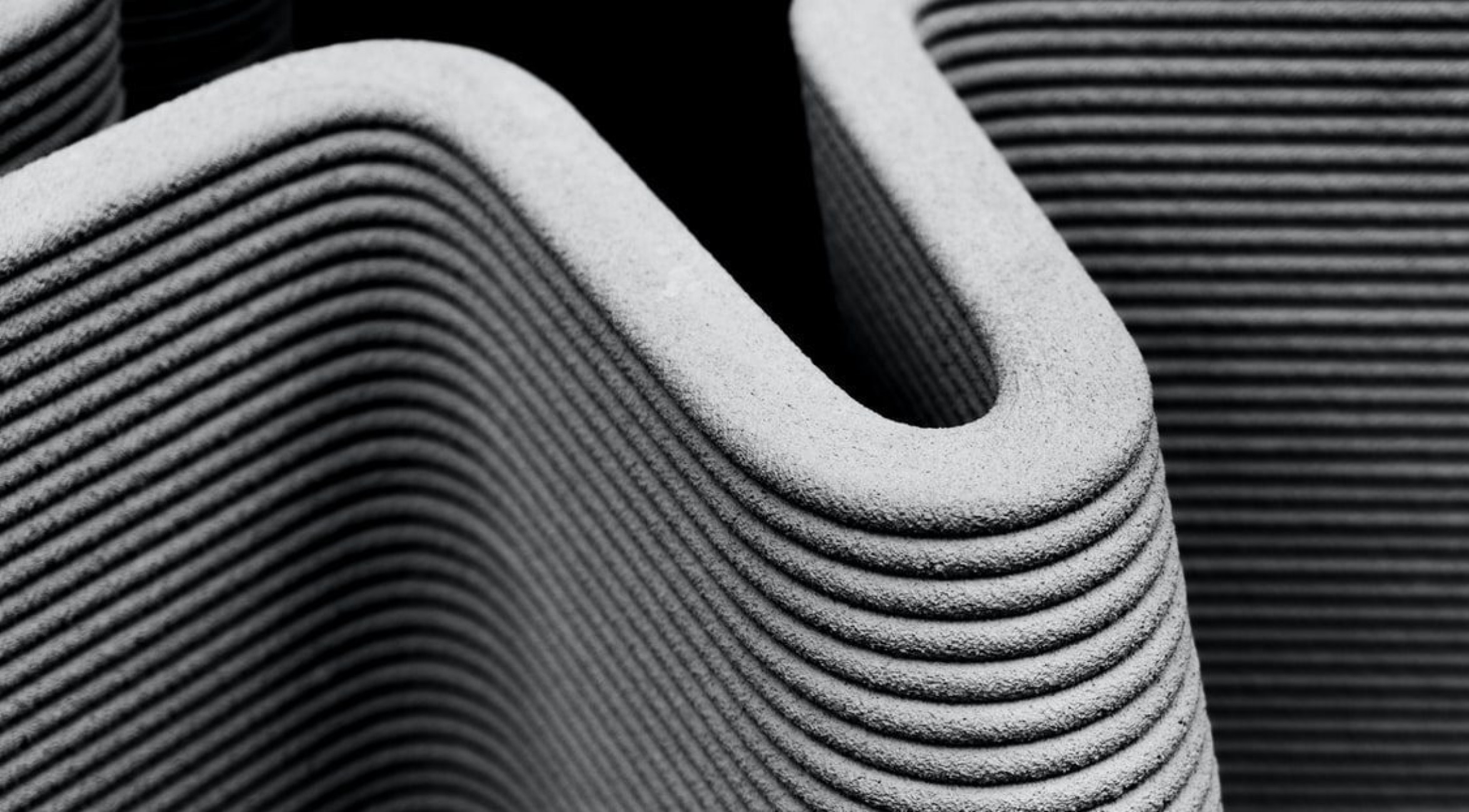 Grayscale close-up of 3D-printed surface